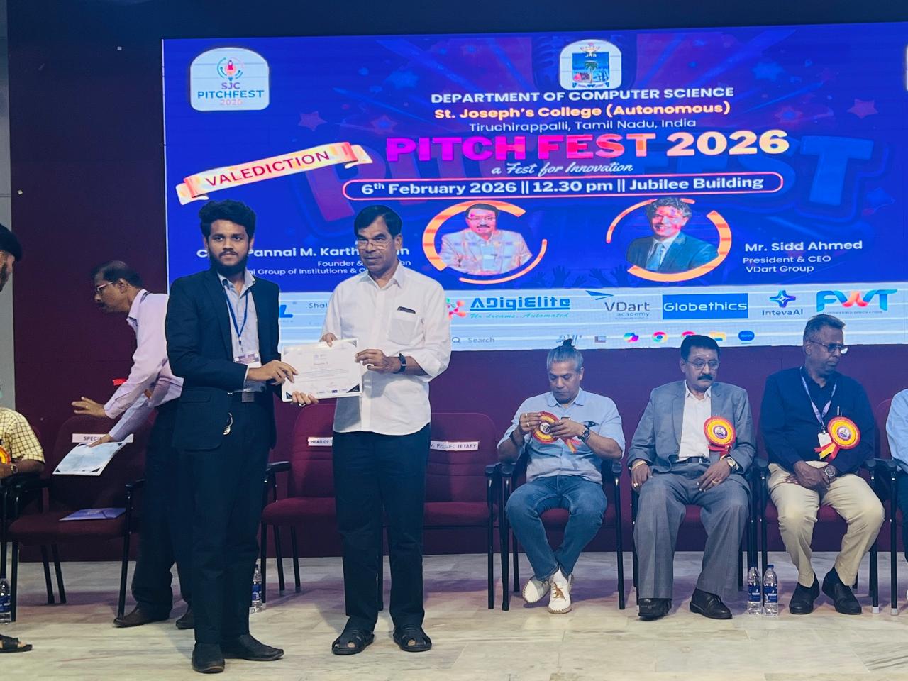Receiving 5th place certificate at PitchFest 26 as a solo competitor